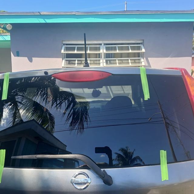Rear window fitted with alignment tape